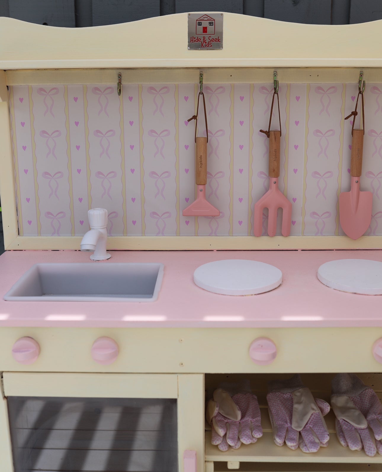 Pink Ribbon Wallpaper for IKEA Play Kitchen and Cubby Makeovers